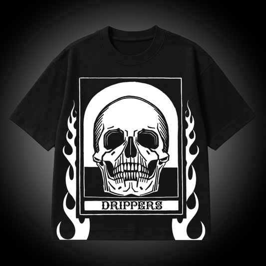 Black t-shirt with a white skull design and 'Drippers' text on a dark background