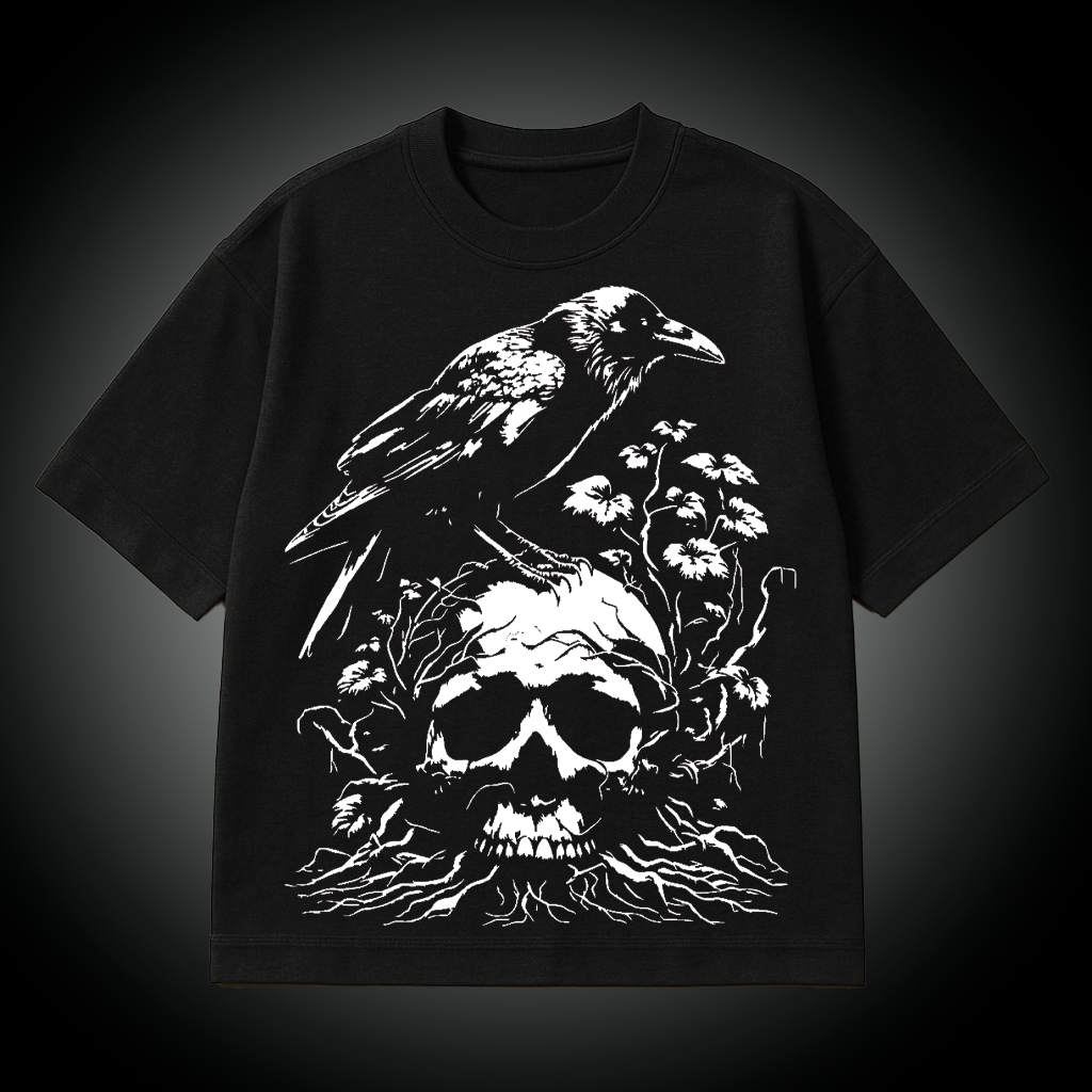 Black t-shirt with a white graphic of a raven on a skull and flowers on a dark background